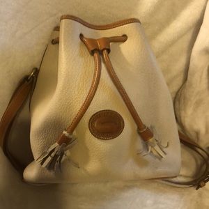 Vintage Dooney and Bourke cream and tan drawstring purse